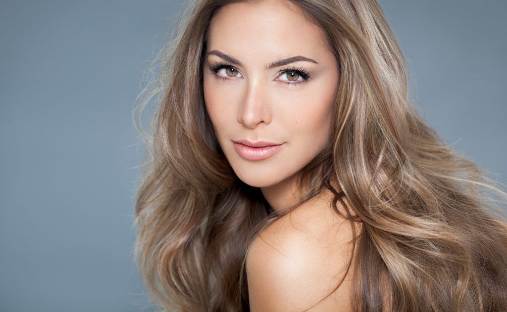 Woman with professional, specialty highlights in Denver