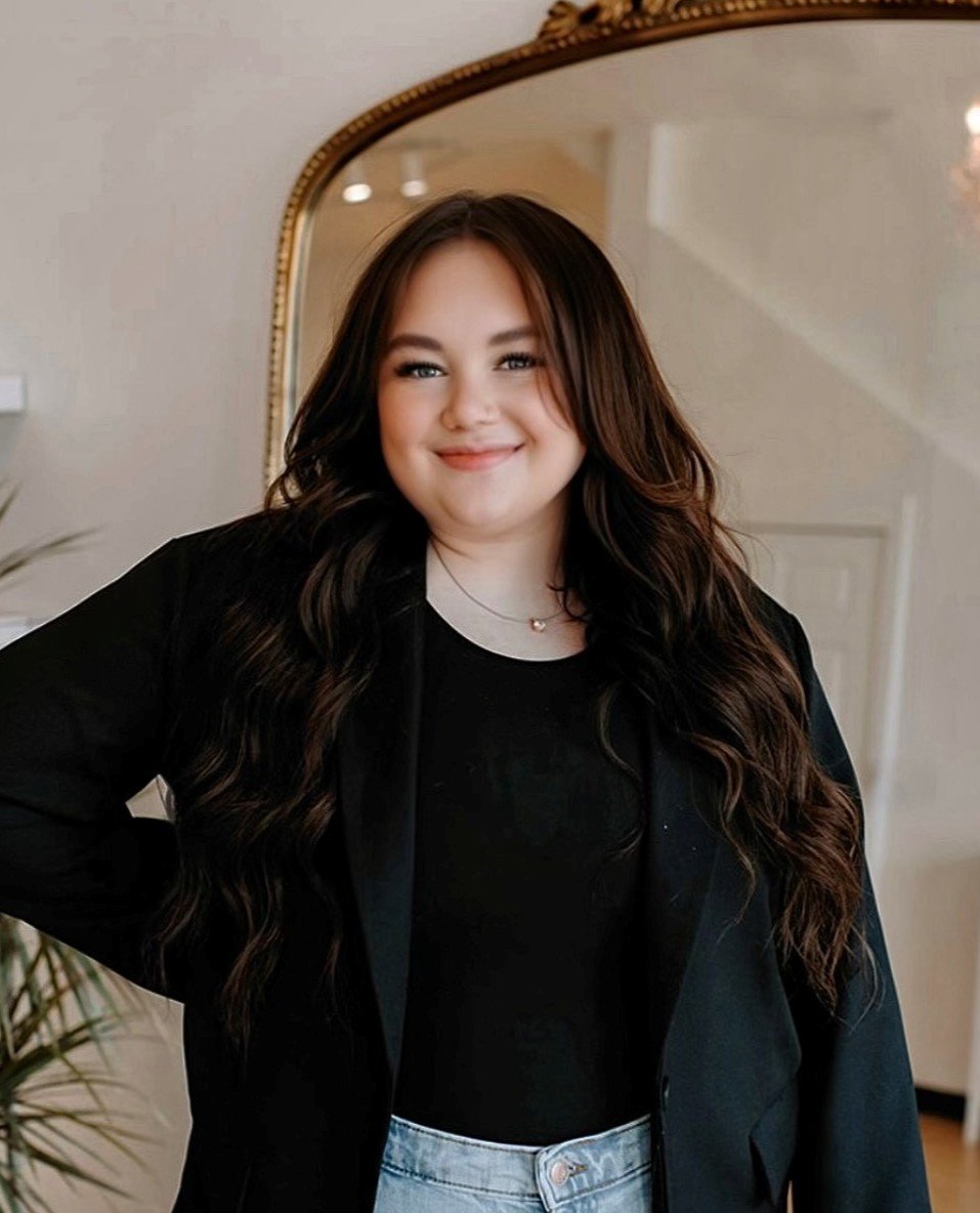 Kenzie Lawrence, hairstylist at Deseo Salon & BlowDry in Denver, specializing in blonding, lived-in color, custom color, and hair extensions