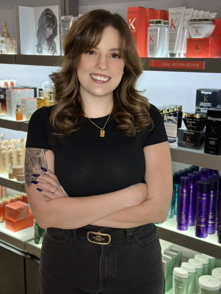 Sarah Bohr, hairstylist at Deseo Salon & BlowDry in Denver, specializing in precision haircuts, dimensional color, lived-in blondes, and blonde transformations